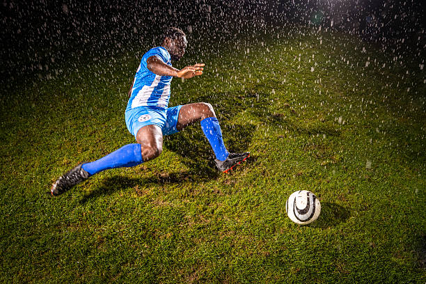 Popular soccer player shooting a bicycle kick.