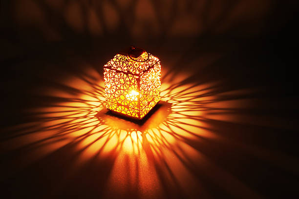 Arabic lantern with light rays Greeting card for Muslim community holy month Ramadan Kareem