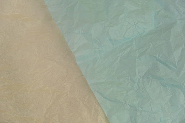 istock Texture of plain crumpled paper as a background 2255547328