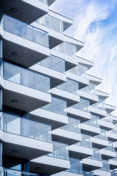 istock Rows of balconies in modern apartment building 2255549619