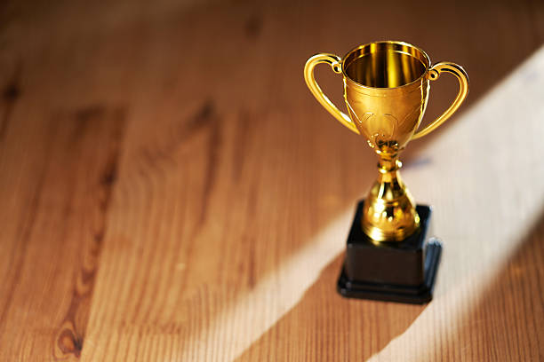 trophy on the wooden table