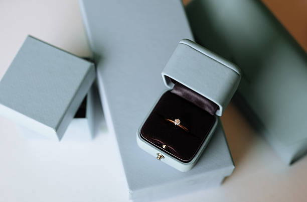 istock Marriage proposal concept with ring and two glasses of wine 2255584329