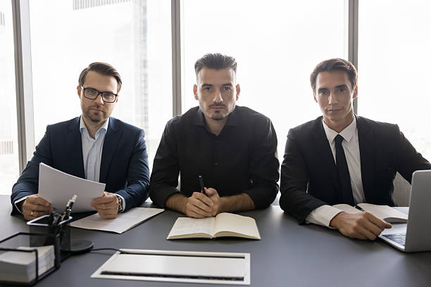 istock Portrait of three young 35s HR managers interviewing applicants 2255591725