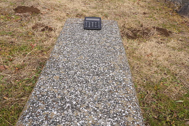 Tuesday, May 13, 2025 – Woodbury, Connecticut. A grave marker is secured by a wooden brace to allow for proper restoration. In South Cemetery, one of Connecticut’s oldest burial grounds, efforts continue to preserve Woodbury’s history through the careful repair of aging and deteriorating headstones.