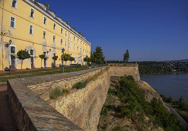 Novi Sad, Serbia - August 14, 2025: View of the Petrovardin Fortress above the Danube River.