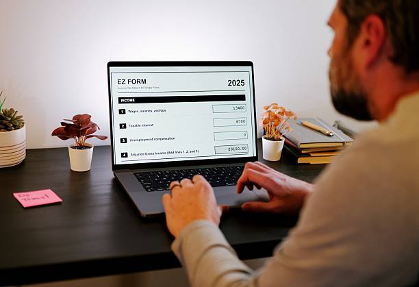 istock Older Man Doing 2025 Taxes Finds Odd Deductions 2255623344