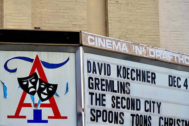 Arlington, Virginia, USA - December 6, 2025: The Arlington Cinema ’N’ Drafthouse Theater marquee advertises an upcoming comedy show by The Second City, Gremlins, and David Loechner as well as “Spoons Toons”.