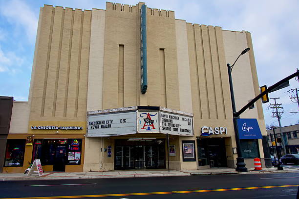 Rows of Plush red seats in a theatre