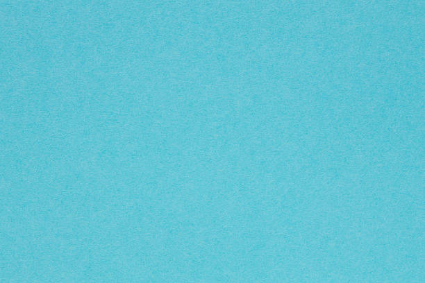 istock Textured Turquoise Blue Paper Background with Subtle Grain Surface for Design 2255632191