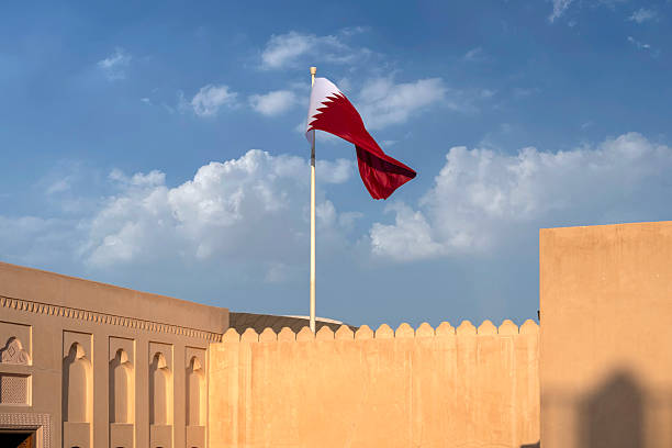 istock Qatar Flag flying high in the wind. Qatari Falg 2255635852
