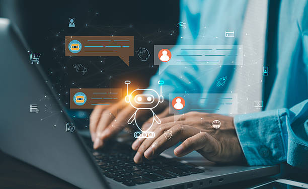 istock Businessman working on laptop with virtual AI chatbot assistant for business communication. Concept of automated support and smart office technology. 2255640864