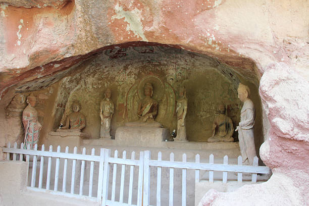 Buddha and Bodhisattvas statues was carved in this shallow niche at Bingling Temple Grottoes in Yongjing County, Gansu Province