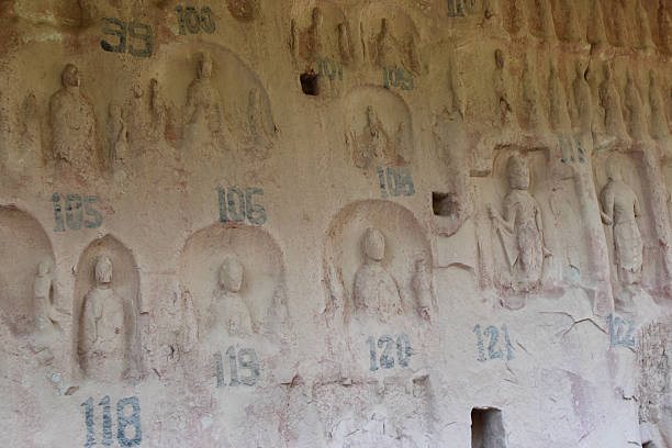 Buddha and Bodhisattvas statues was carved in this shallow niche at Bingling Temple Grottoes in Yongjing County, Gansu Province