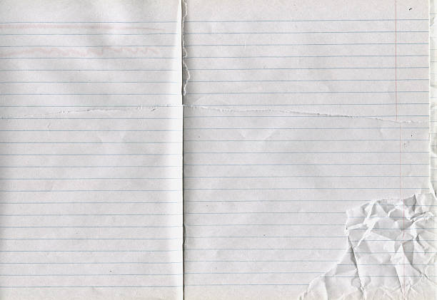 istock Crumpled lined paper texture with strong folds and soft shadows. 2255651045
