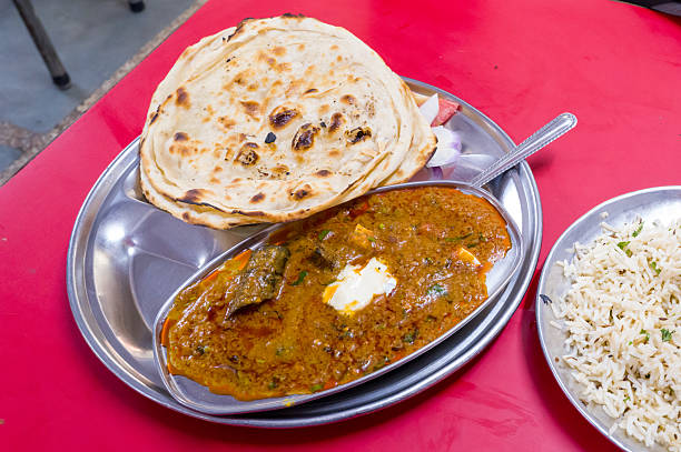 Paneer butter masala with naan and rice Delhi