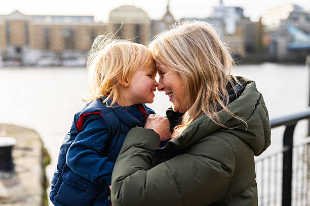 istock Grandmother and child sharing affectionate moment outdoors in London 2255659275