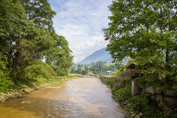 istock River winding through lush green valley, Sapa 2255662779