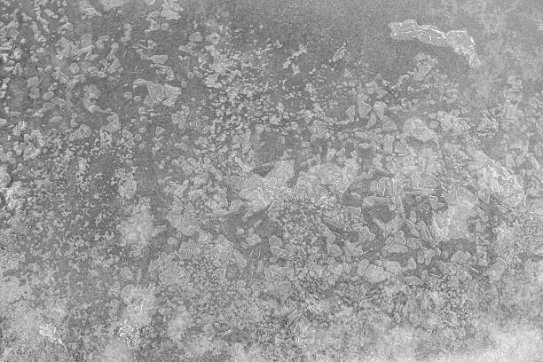 Texture of frozen water with crystals. Top view.