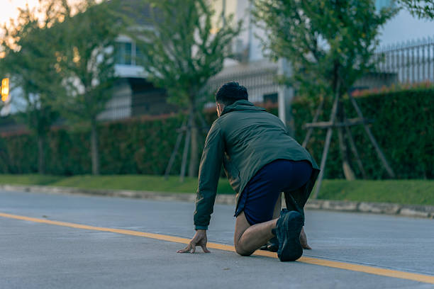 Runners start to begin running as part of a health-focused exercise program.