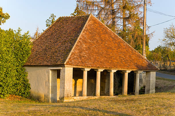 istock Traditional stone washhouse in evening light 2255704727