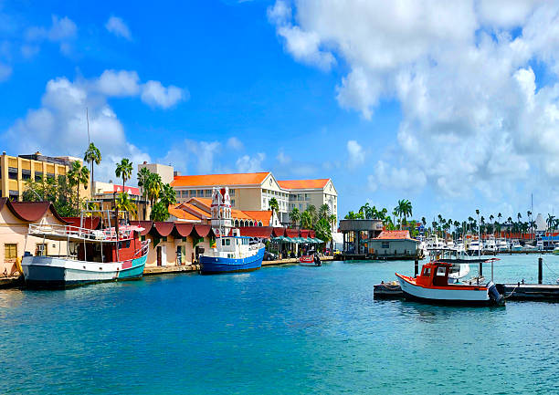 Beautiful pink colored facade of Dutch colonial architecture in city center of Oranjestad, Aruba.