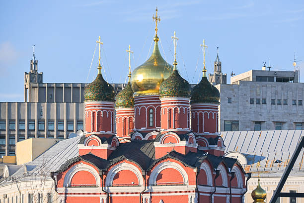 View of the Cathedral of the Icon of the Mother of God of the Sign (Znamensky Cathedral) on Varvarka Street and Zaryadye Park on a snowy winter day, Moscow, Russia