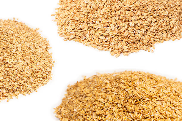 Oat-flakes isolated on a white background. Top view.