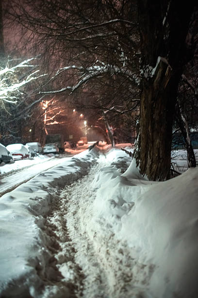 empty street of a little town or community covered with snow