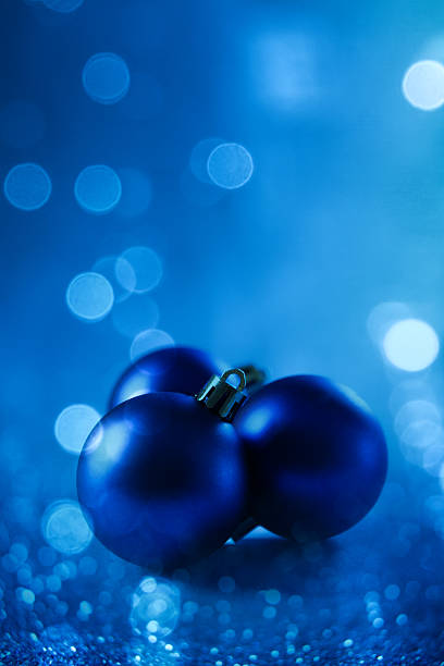 Blue christmas decoration on blue bokeh background with copy space