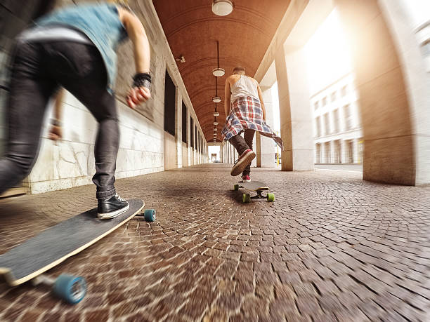 Skateboard, smoke and freedom with friends in city for gen z youth, streetwear fashion and balance. Fitness, energy and Happiness with women skating in street for riding, hobby and action together