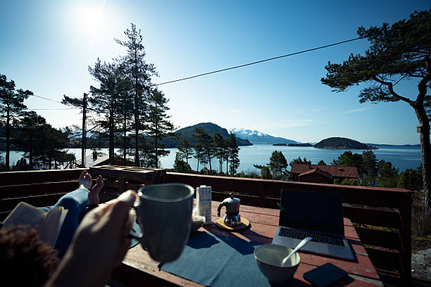 Morning Coffee on Cabin Terrace Overlooking Norwegian Fjord