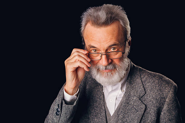 istock Senior man adjusting glasses, looking at viewer 2255751968
