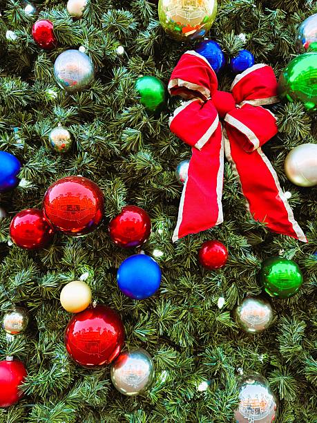 christmas tree ornaments and red bow