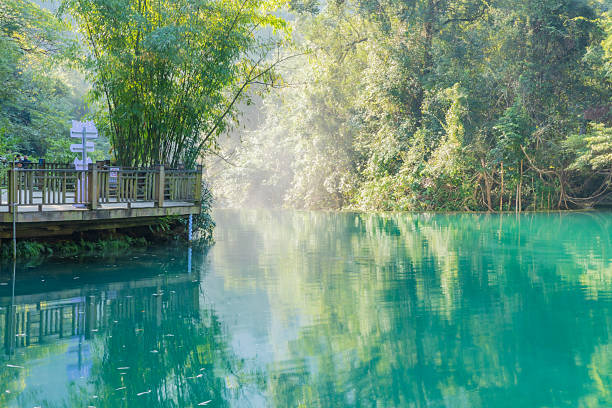 Libo Xiaoqikong: Guizhou's emerald gem with seven-arch bridge and karst wonders