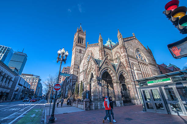 Boston, MA, USA - December 30, 2025: A cold winter morning on the popular Boylston Street, where the Old South Church can be seen across from the Boston Public Library, in Massachusetts, USA.