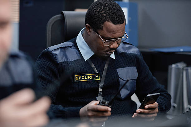 istock Middle Aged Black Man Monitoring Security Devices While Sitting Indoors 2255822167
