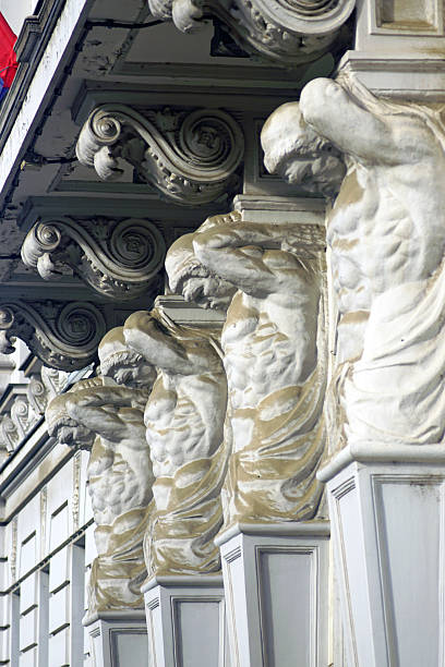 istock Sculpted atlantes supporting an historic building facade in Belgrade. 2255835433