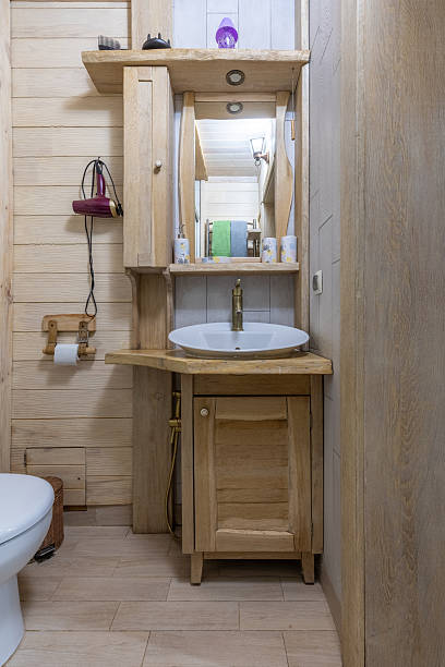 istock Rustic wooden bathroom vanity with vessel sink and mirror 2255845587
