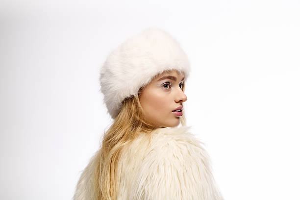 istock Winter elegance shines through cozy knitted outfits and winter makeup 2255852556