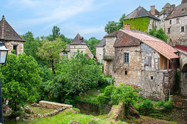 View of the 'King's Tower', or 'King's Keep', origin unknown, and  local architecture in Saint-Émilion, France.