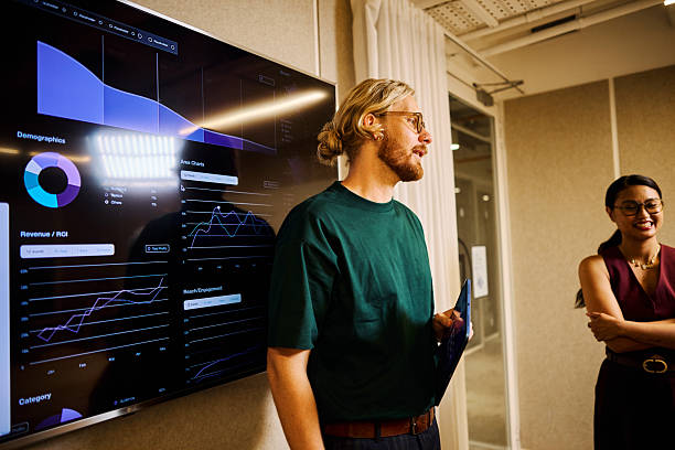 istock Diverse startup team discussing ai data in meeting 2255857327