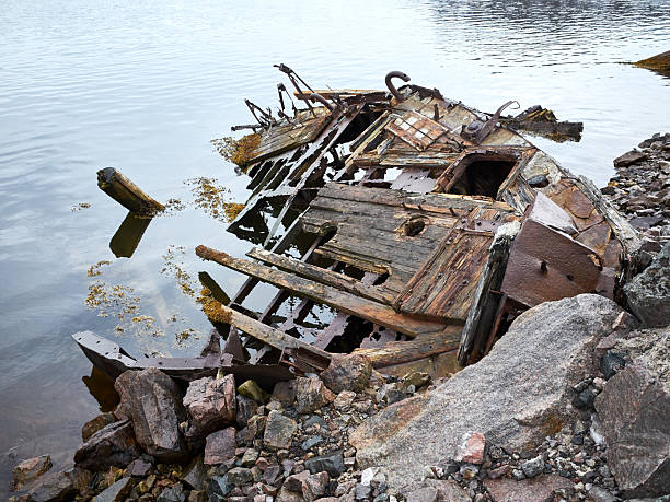 Old wrecked rusty ships near northern shore in Teriberka, Murmansk region