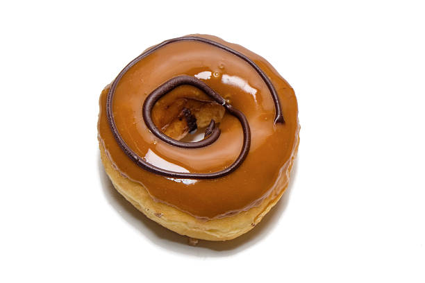 Side view of Chocolate donut on white background