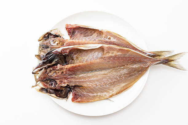 istock Dried horse mackerel on a plate on a white background 2255870754