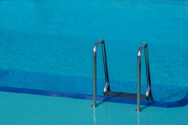 Swimming pool and ladder.
