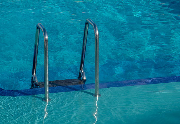 Swimming pool and ladder.