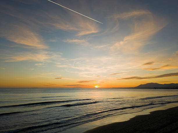 Beautiful sunset on the beach in Marbella, Andalusia