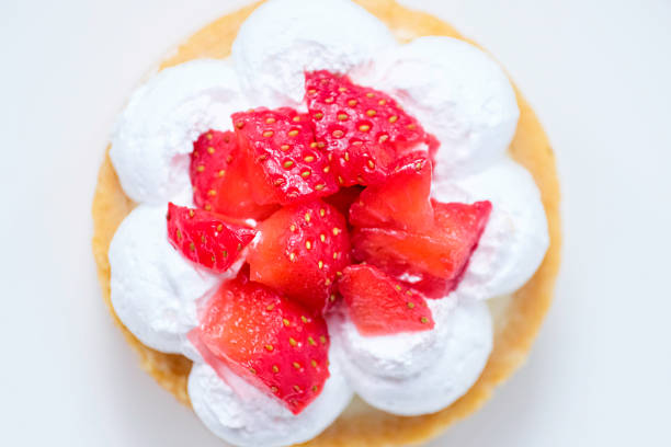 Strawberry cheese tart on a white plate