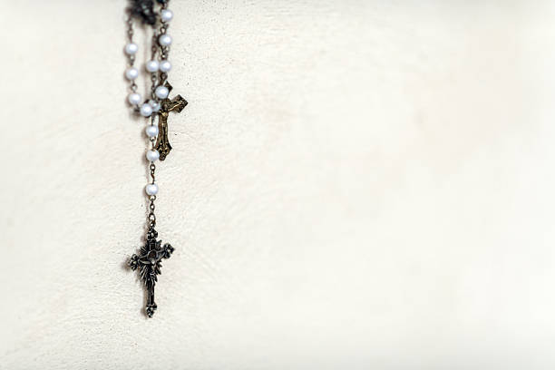 Rosary beads on church wall
