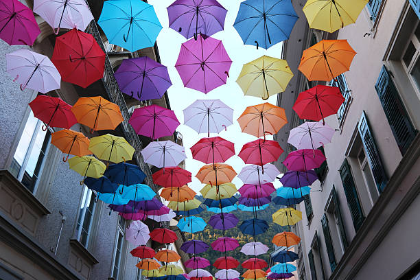 Interlaken, Switzerland-Oct.1st 2025: many colorful umbrellas hanging outdoor